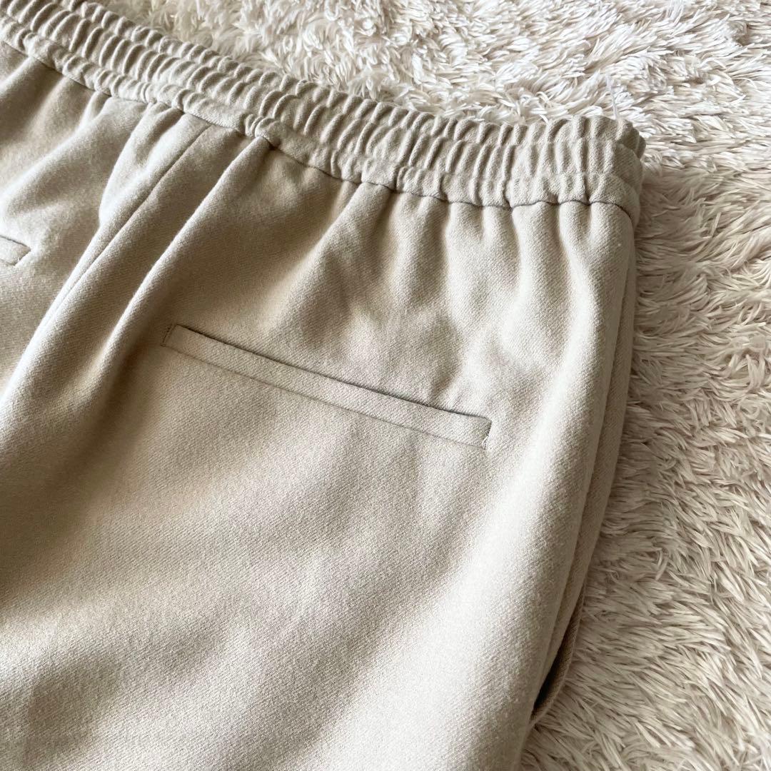 プルミエアロンディスモン 美品 ストレッチテーパードパンツ 38
